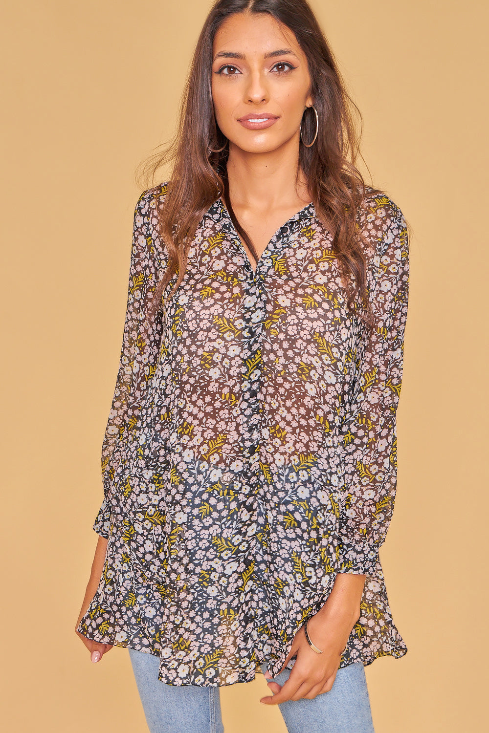 Blusa con botones delanteros larga